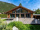 Located in the highly sought-after area of Les Tines, this modern property is situated within walking distance of the Chamonix golf course.